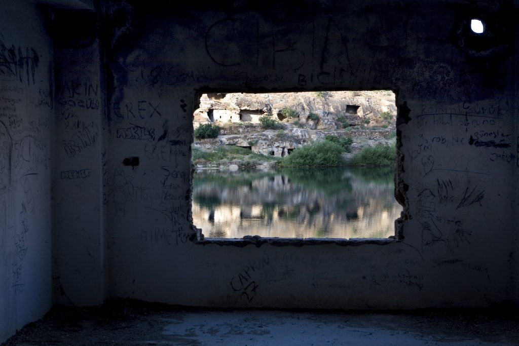Savasan Village is partially submerged in 1999 under the water behind the dam on the Euphrates at Birecik. There are two families still living in the old village.